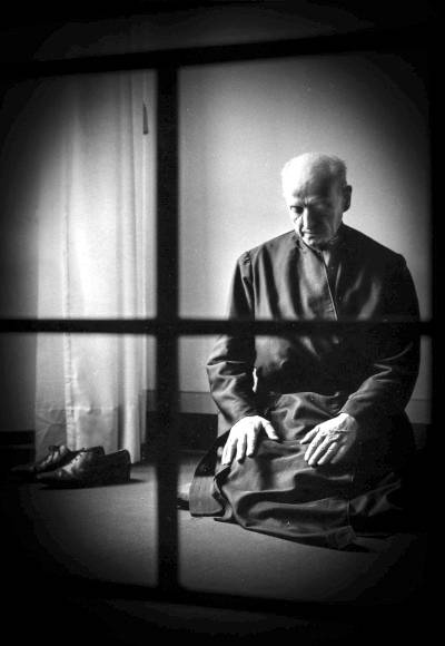 Fr Pedro Arrupe SJ, 28th Superior General of the Society of Jesus (the Jesuits) in prayer at the Jesuit General Curia in Rome