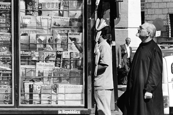Fr Peter-Hans Kolvenbach, 29th Superior General of the Society of Jesus (the Jesuits), in front of a newsagents in Rome. Image by Don Doll SJ