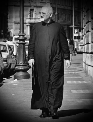 Fr. Peter-Hans Kolvenbach SJ, 29th Superior General of the Society of Jesus (the Jesuits), walking in Rome near the Jesuit General Curia
